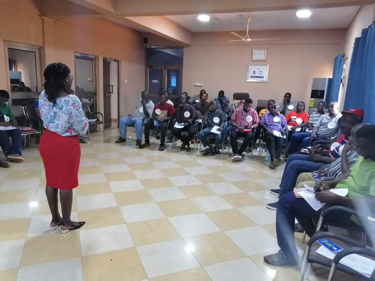 Facilitator addressing participants during a session
